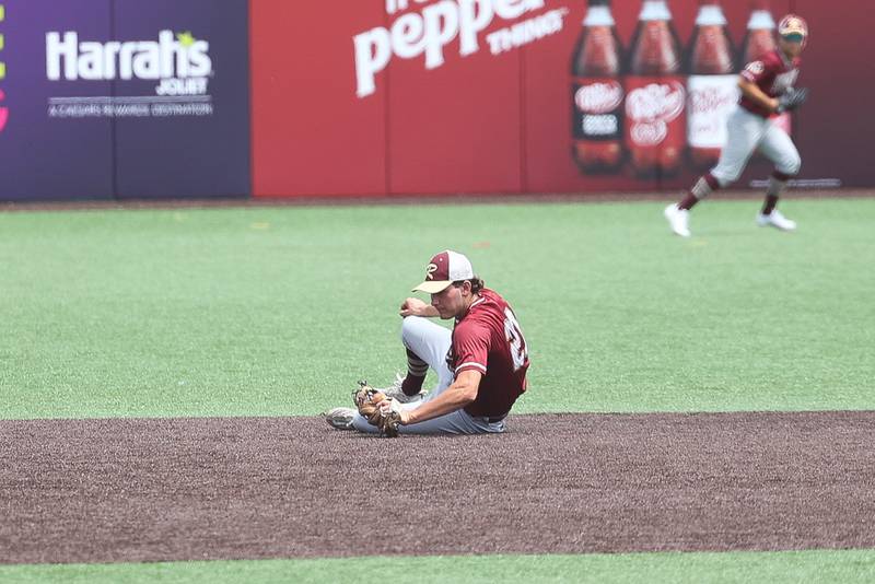 Morris’ Nazim Baftiri makes a diving stop against Highland in the IHSA Class 3A 3rd place game on Saturday June 8, 2024 Duly Health and Care Field in Joliet.