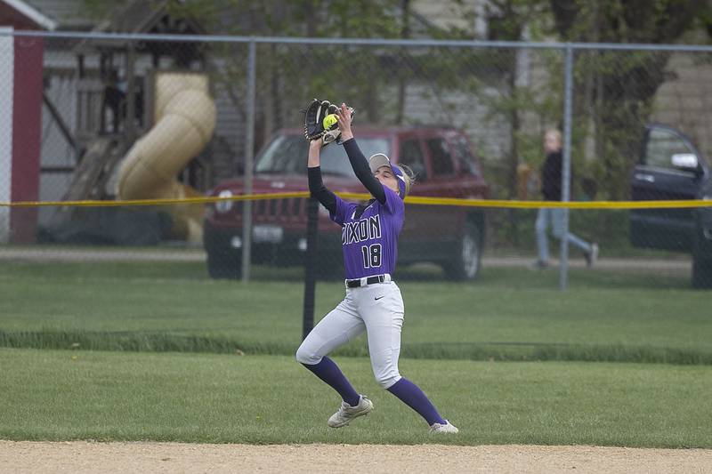 Dixon’s Bailey Tegeler hauls in a fly ball against Rock Falls Tuesday, May 2, 2023.