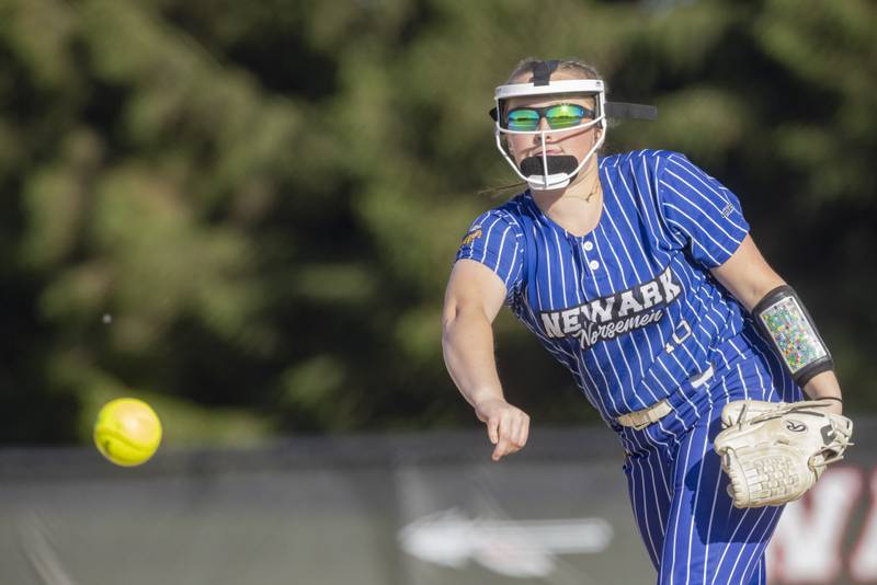 Newark's pitcher Dottie Wood throws a strike against Grant Park during the Class 1A Sectional Semifinal game at Woodland High School on May 22, 2024.