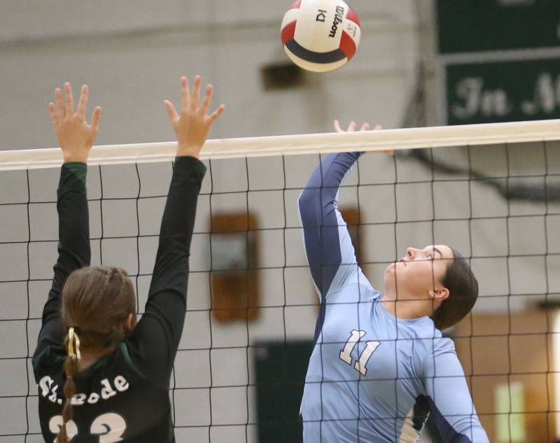 Bureau Valley's Madison Smith spikes the bal past St. Bede's Mary Quinn McClain on Monday, Sept. 9, 2024 at St. Bede Academy.