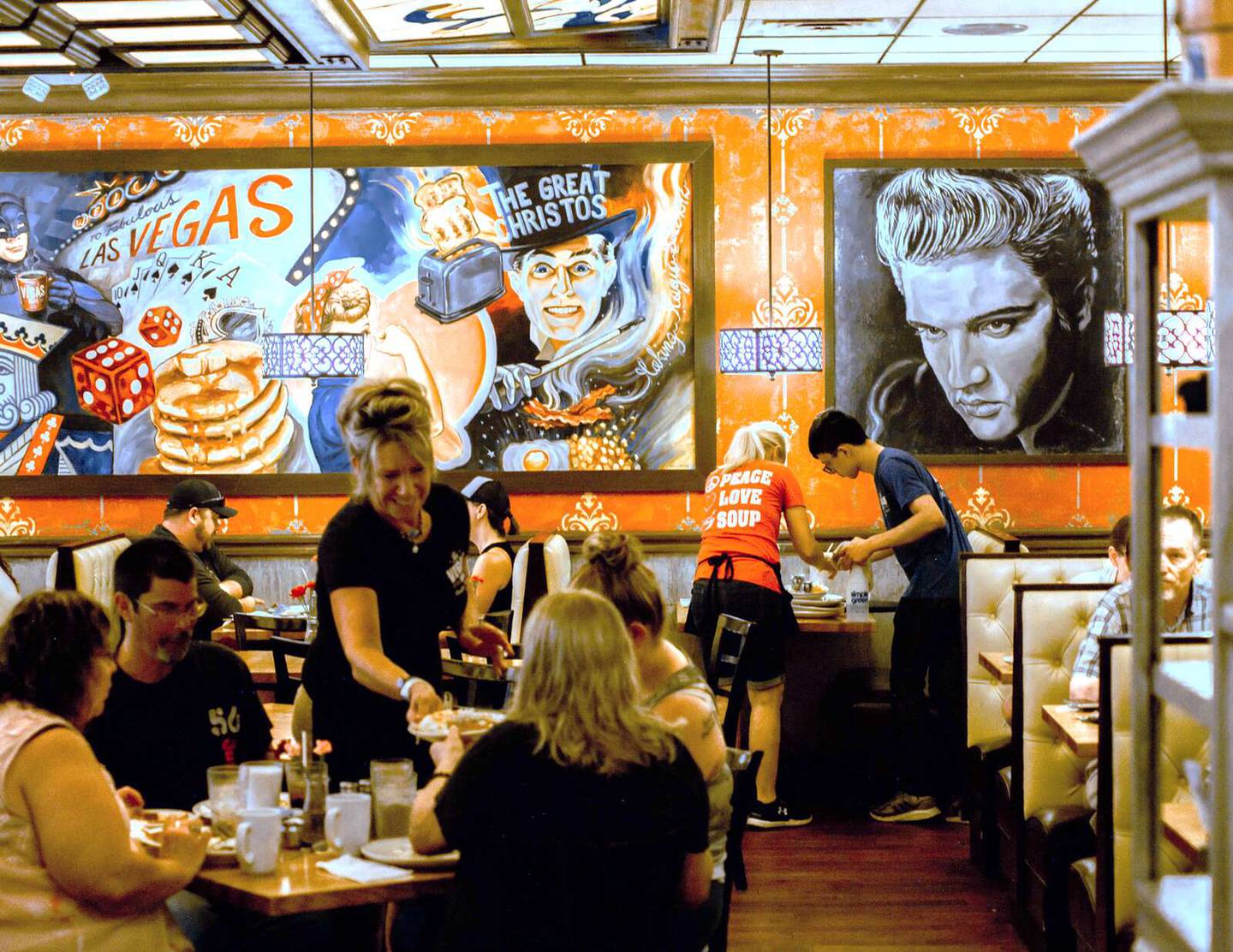 Las Vegas-themed artwork greets patrons of The Vegas Cafe in Antioch.