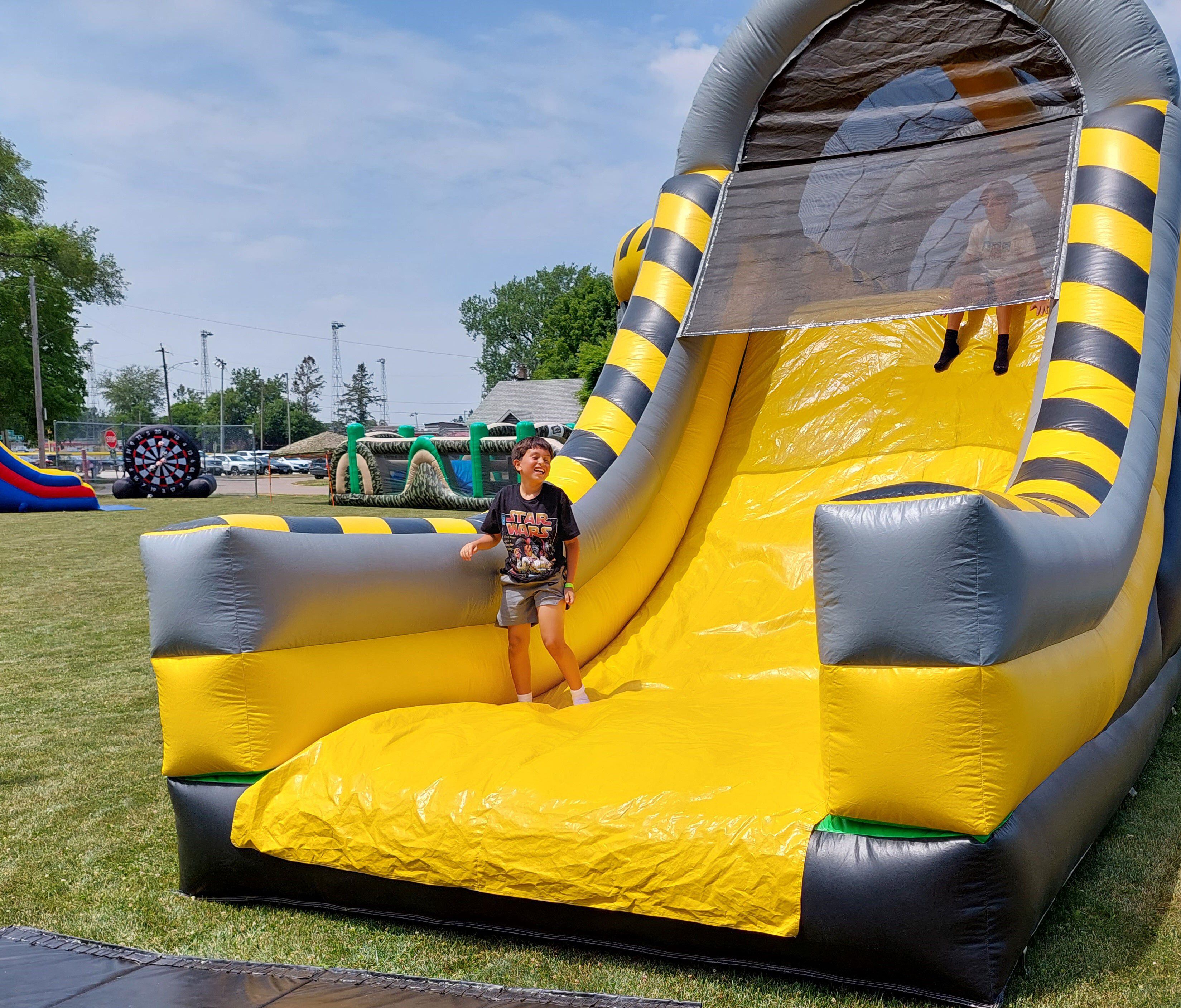 A number of inflatable obstacle courses and bounce houses filled Kirby Park in Spring Valley on Saturday, June 10, 2023, for Summerfest.