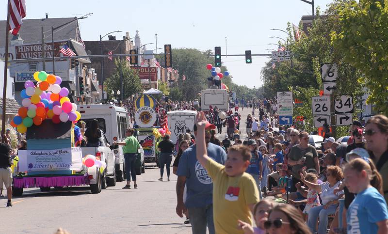 A large crowd watches the parade roll along Main Street downtown Princeton for the 52nd annual Homestead Festival on Saturday, Sept. 9, 2023.