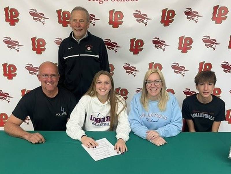 La Salle-Peru senior Kaylee Abens (seated, center) signed to play volleyball at Lincoln Land College.