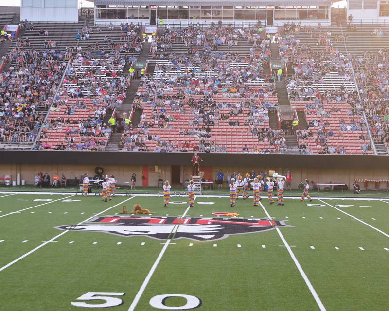 Conquest Drum & Bugle Corps out of Geneseo, Illinois, perform at Northern Illinois University Huskie Stadium in DeKalb Saturday for the 2024 Drum Corps International Midwest Classic.