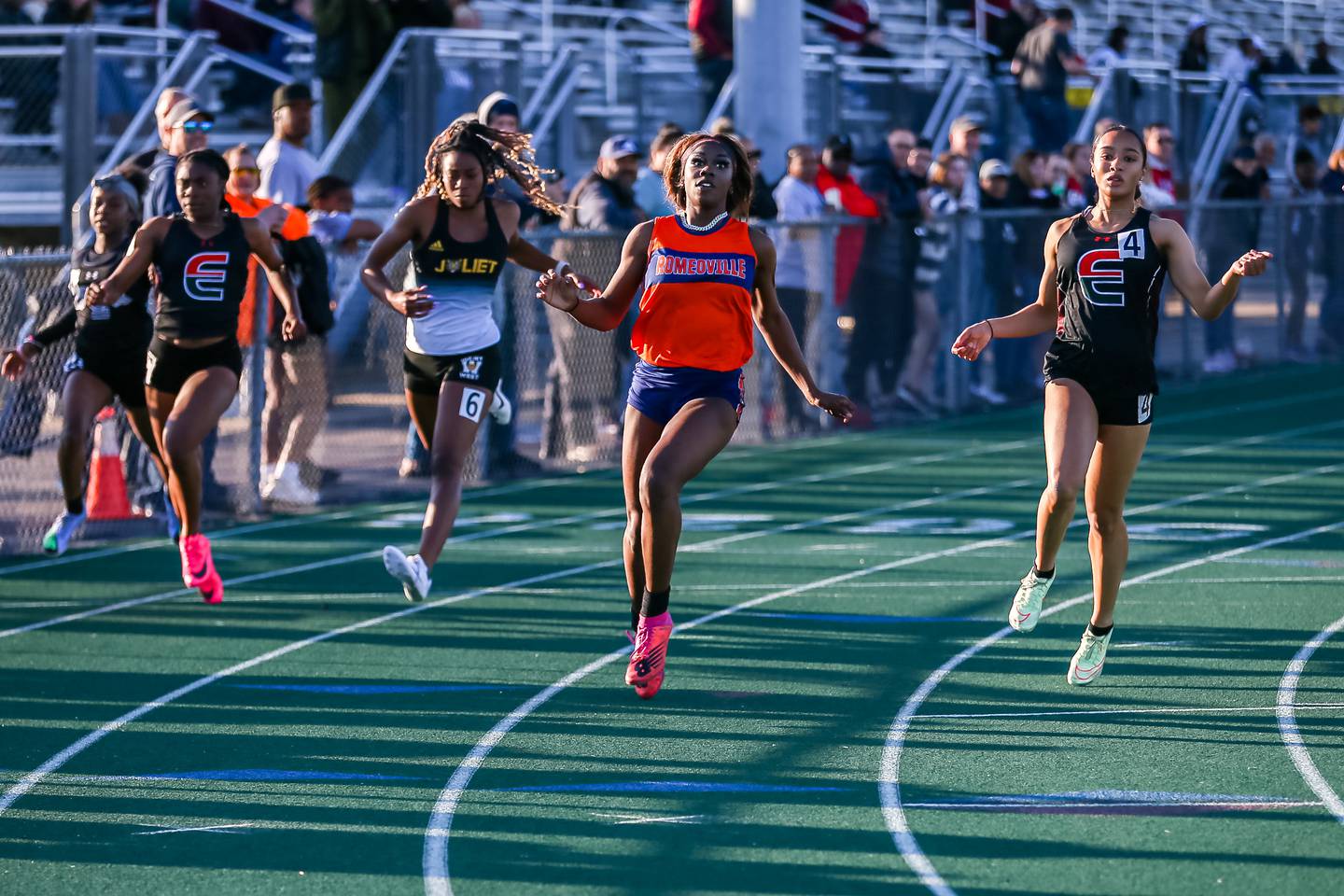 Romeoville's Tania Miller wins the 100-meter dash at the Southwest Prairie Conference Meet held May 3, 2023.