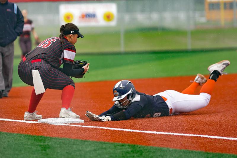 Yorkville's Regan Bishop (15) forces out Oswego’s Natalie Muellner (18) during a softball game at Yorkville High School on Thursday, May 9, 2024.