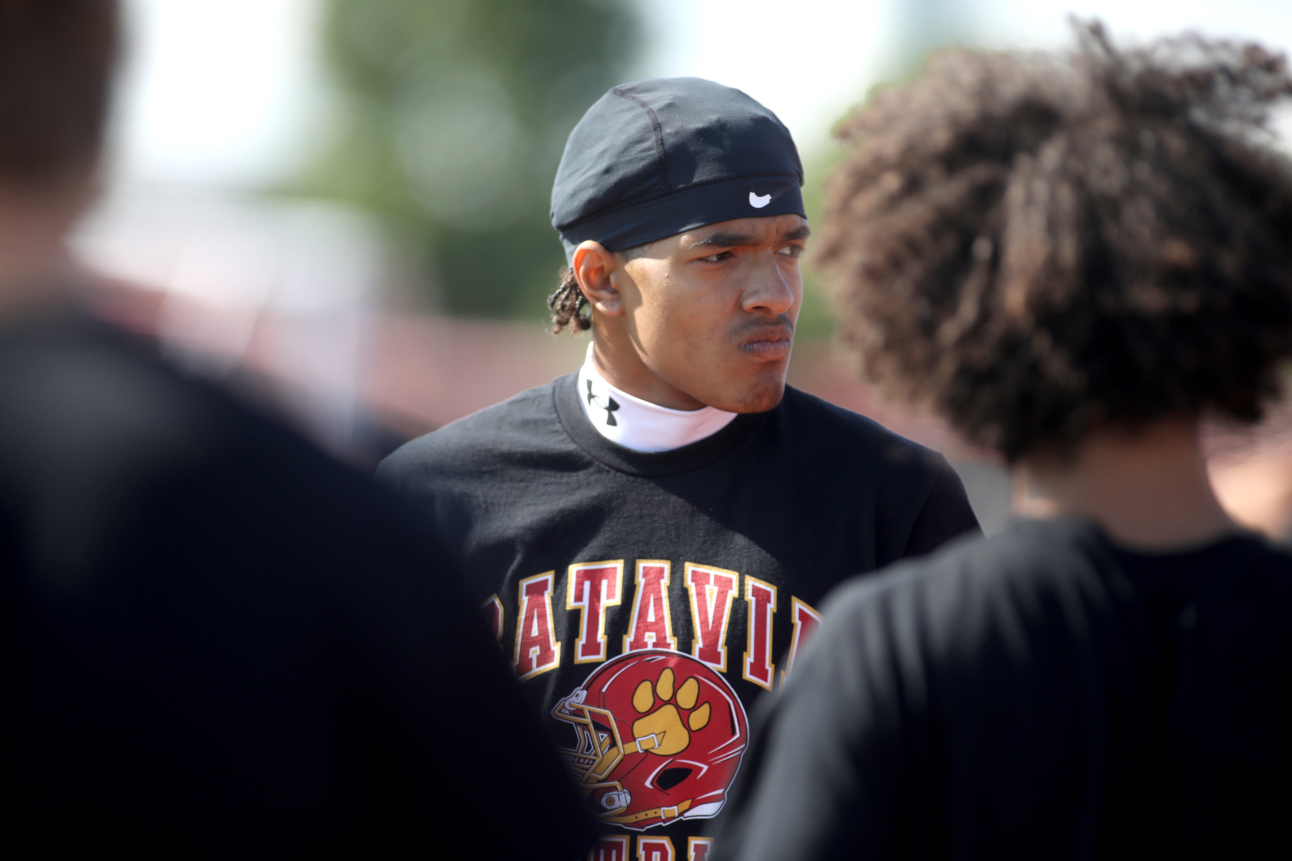 Batavia’s Isaiah Brown talks to his teammates on the sideline during a 7-on-7 tournament at Batavia High School on Thursday, July 18, 2024.