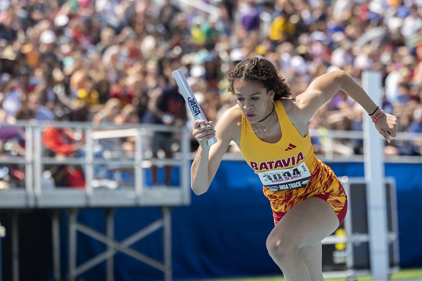 Batavia’s Madison Wilson fires of the blocks in the 3A 4x200 Saturday, May 18, 2024 at the IHSA girls state track meet in Charleston.