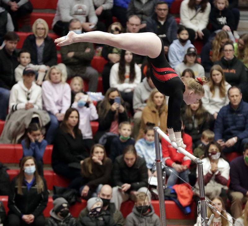 Hinsdale Central’s Kelly Klobach competes on the Uneven Parallel Bars during the IHSA Girls Gymnastics State Finals Saturday February 19, 2022 at Palatine High School.