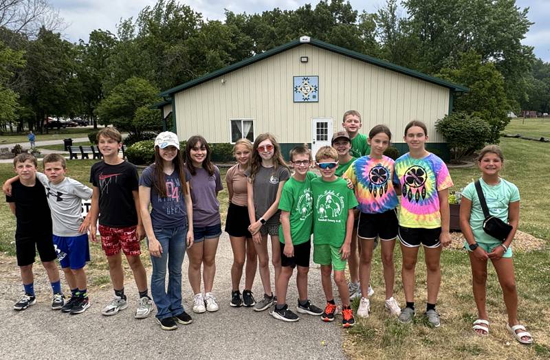 4-H youth helped take tickets, serve meals and thank supporters during the annual drive-through pork chop dinner fundraiser on Thursday, June 20.
