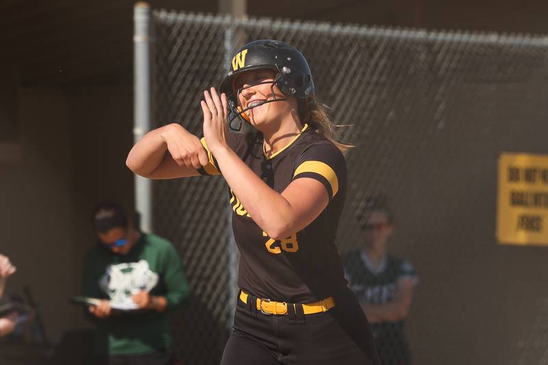 Joliet West’s Brooke Schwall celebrates as she heads home after her solo home run against Plainfield Central in May 2024 in Joliet.