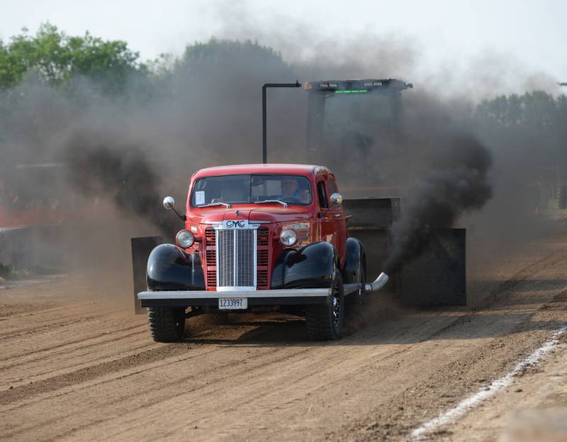 Todd Hollis of German Valley drives his 1938 GMC truck at the Forreston FFA Alumni Tractor and Truck Pull during Leaf River Daze on Saturday.