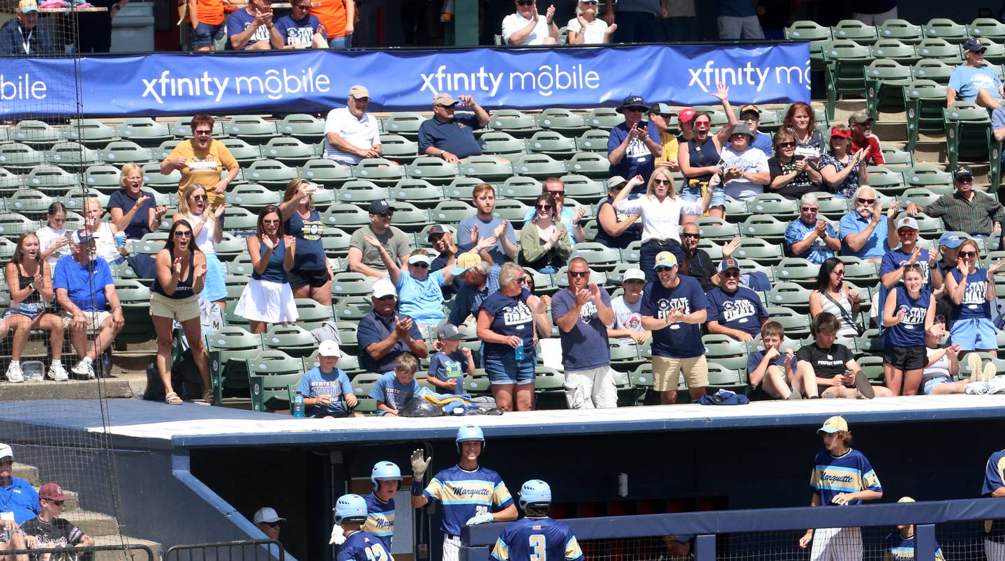 Marquette fans cheer on the Crusaders as they play Routt during the Class 1A semifinal game on Friday, May 31, 2024 at Dozer Park in Peoria.