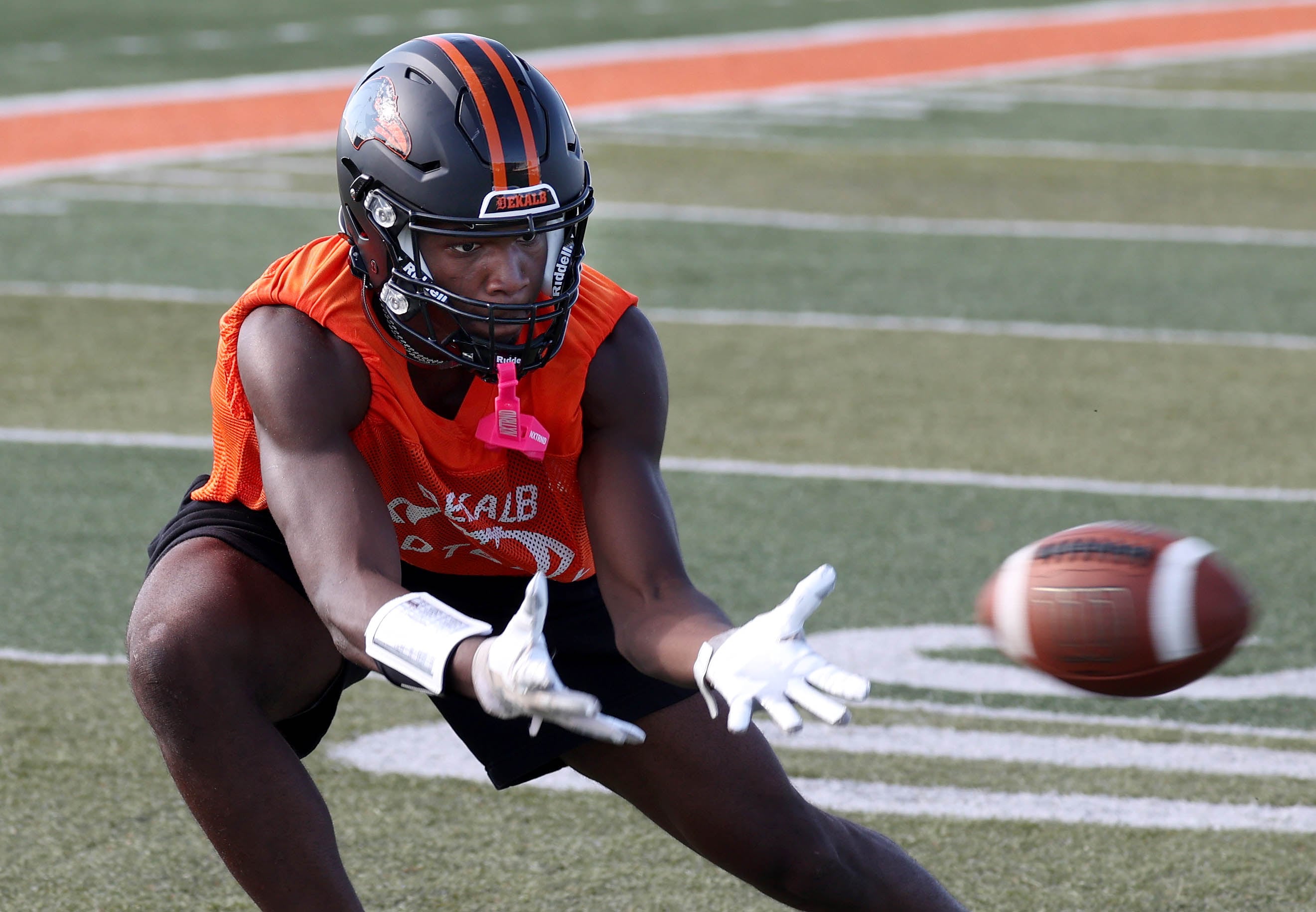 Dekalb’s Davon Grant catches a pass Monday, Aug. 12, 2024, at the school during the first practice of the regular season.