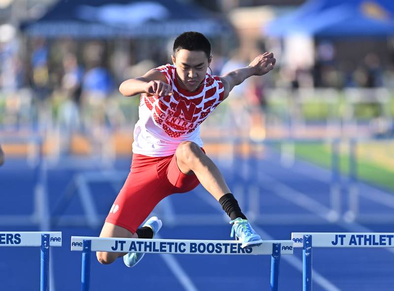 Naperville Central's Drake Wang competing in the 300 meter hurdles during the IHSA 3A Sectional track meet  on Friday, May. 17, 2024, at Joliet.