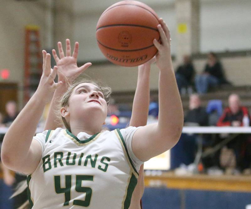 St. Bede's Savannah Bray eyes the hoop against Amboy during the Class 1A Regional final game on Friday, Feb. 16, 2024 at Marquette High School.