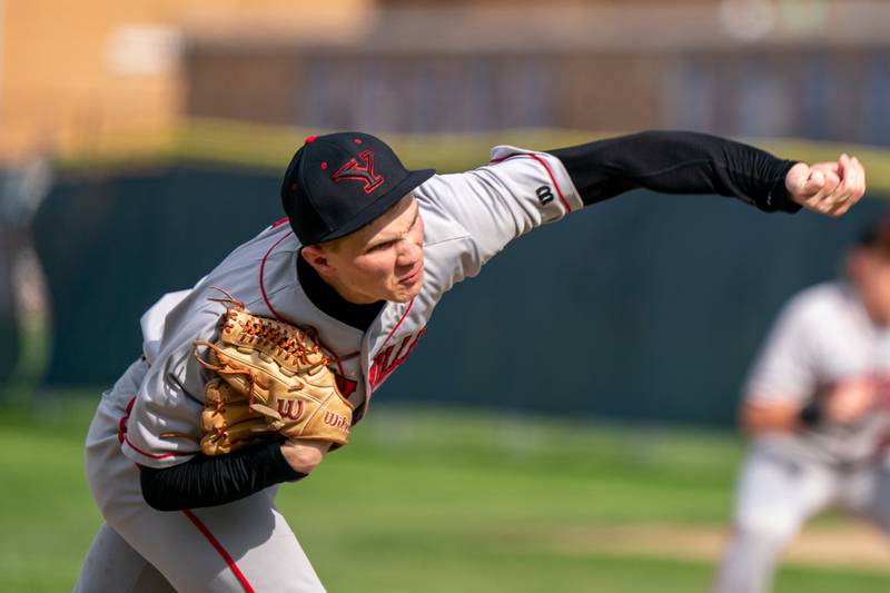 Yorkville's Simon Skroch (16) delivers a pitch against West Aurora during a baseball game at West Aurora High School on Monday, April 24, 2023.