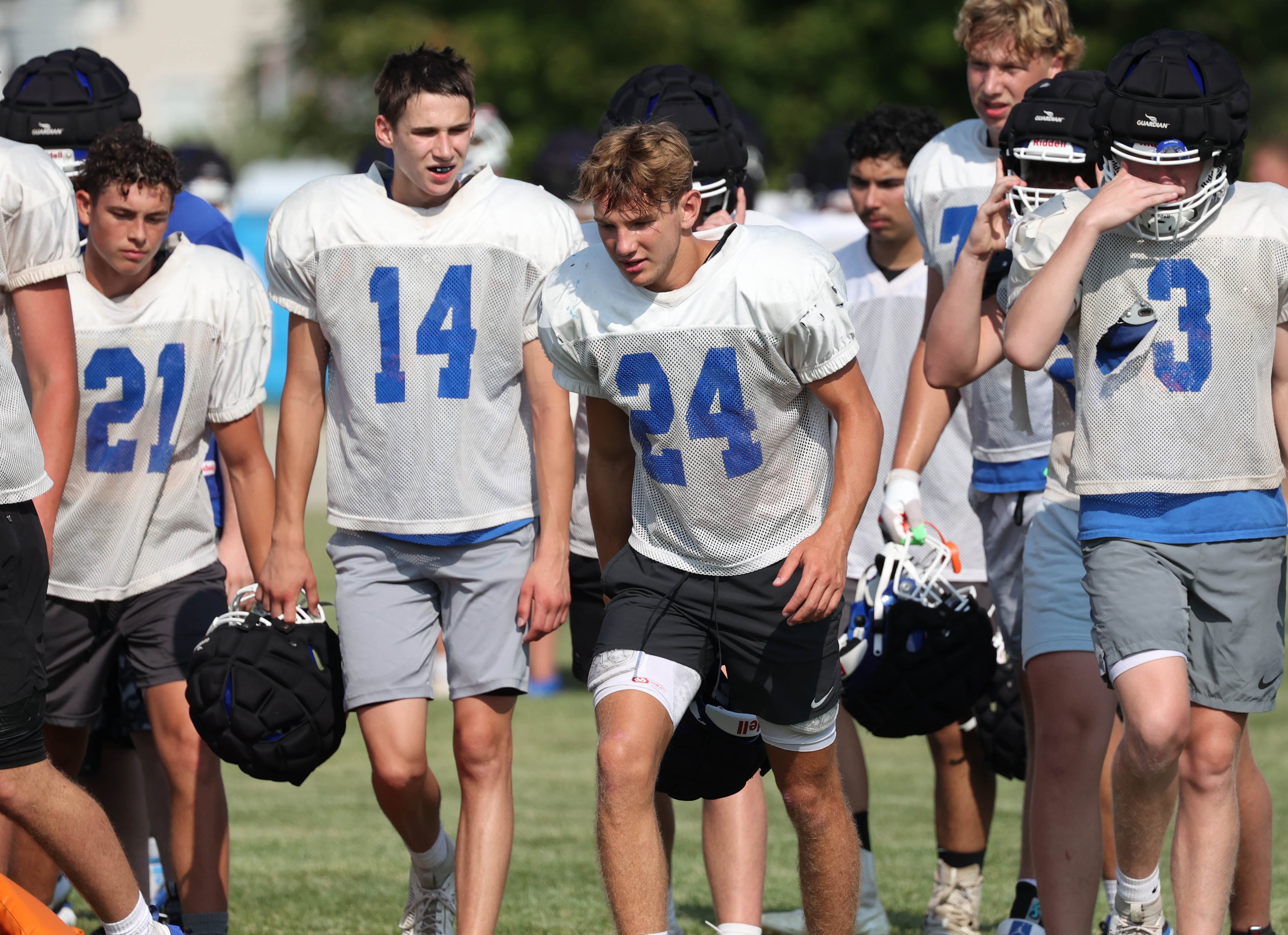 Genoa-Kingston players take the field during practice Wednesday, Aug. 14, 2024, at the school in Genoa.