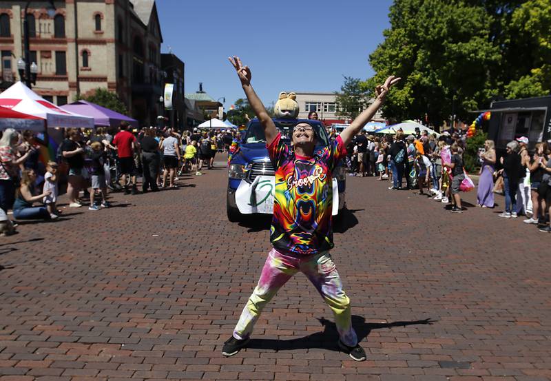 Patrick Pallone works the crowd during the Woodstock PrideFest Parade on Sunday, June 9, 2024, around the historic Woodstock Square.