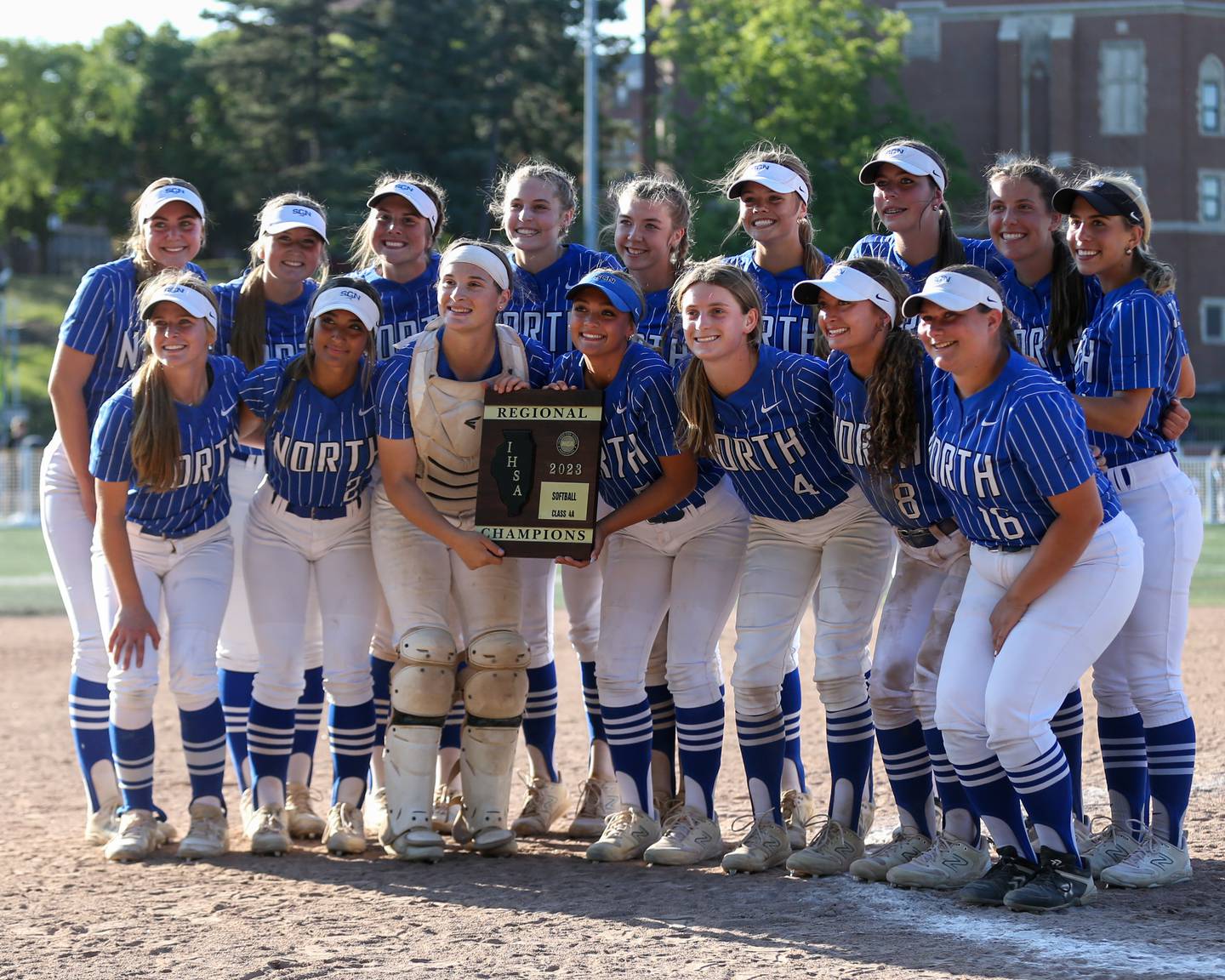 St. Charles North celebrates its victory for the Class 4A Glenbard West Regional over Glenbard North on Friday, May 26, 2023.