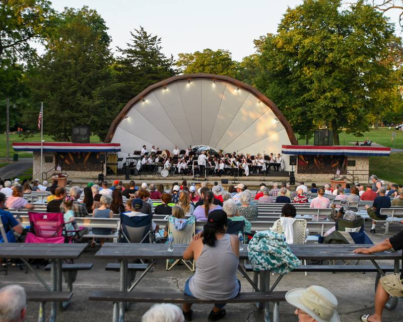 Community members all around DeKalb area gather to listen to the DeKalb Municipal Band and to see fireworks at Hopkins Park in DeKalb Tuesday July 4, 2023 for the city's annual Fourth of July celebration.
