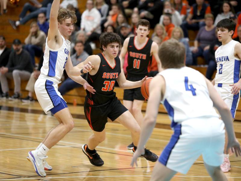 Wheaton Warrenville South’s Luca Carbonaro drives toward the basket during a Class 4A Willowbrook Regional semifinal game against Geneva on Wednesday, Feb. 21, 2024.