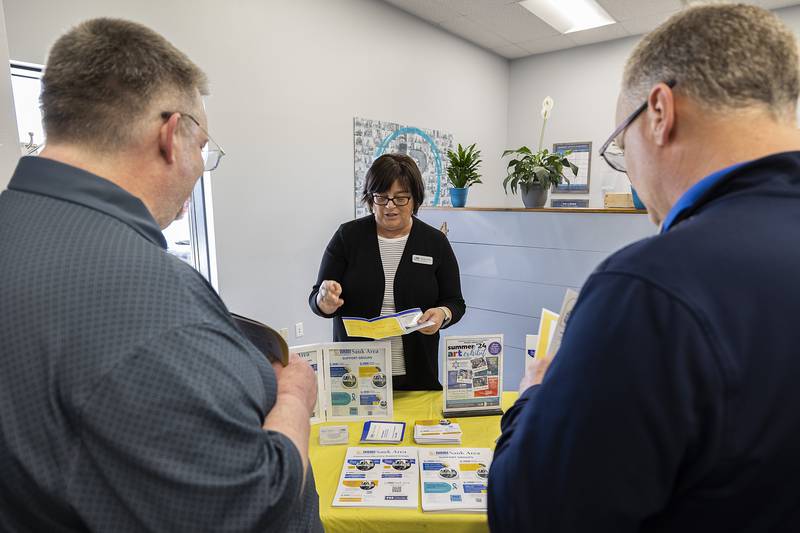 Maggie Wike, co-president for the National Alliance for Mental Illness Sauk Area, speaks about the organization’s efforts Friday, April 12, 2024, during an open house for NAMI Sauk Area’s new office in Sterling.