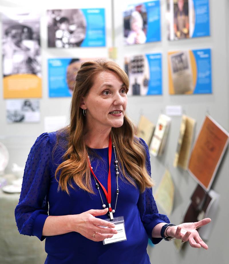 Michelle Donahoe, executive director of the DeKalb County History Center, talks Thursday, June 6, 2024, about the new exhibit “Food: Gathering Around the Table,” now open at the center in Sycamore. The exhibit was created by the DeKalb County History Center in collaboration with the Smithsonian Institution's Museum on Main Street program.