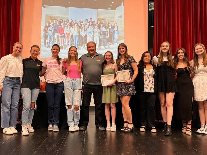 Recipients of the Cassie Marino Foundation scholarships with Marino's family.