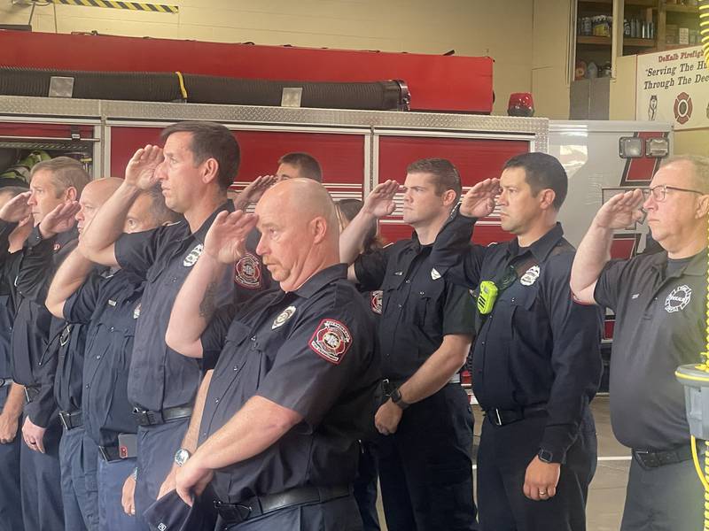 Members of the DeKalb Fire Department give a salute Sept. 11, 2024, to honor the lives of those who paid the ultimate sacrifice in the tragedy that shook this nation 23 years ago on this day in history.