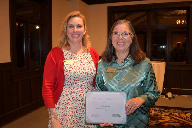 Forest Preserve District of Will County Volunteer of the Year Sally Wieclaw (right), with Barbara Sherwood, the Forest Preserve’s restoration ecologist.