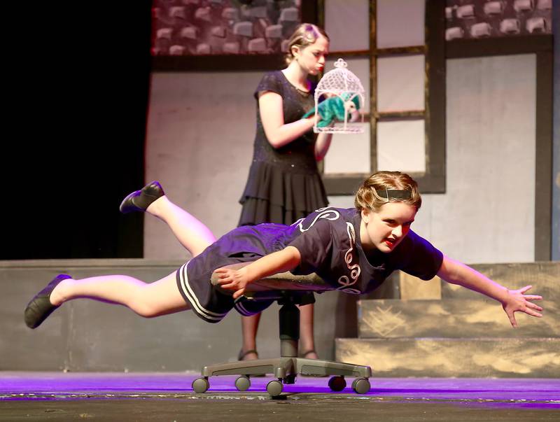 (Foreground) Veronica Regelbrugge and (background) Lexi Wimmer in Failure: A Love Story, during dress rehearsal on Wednesday, Oct. 19, 2022 at Kaneland High School in Maple Park.