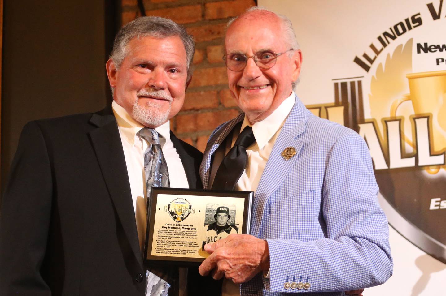 Guy Hoffman poses for a photo with emcee Lanny Slevin during the Illinois Valley Sports Hall of Fame awards banquet on Thursday, June 6, 2024 at the Auditorium Ballroom in La Salle.