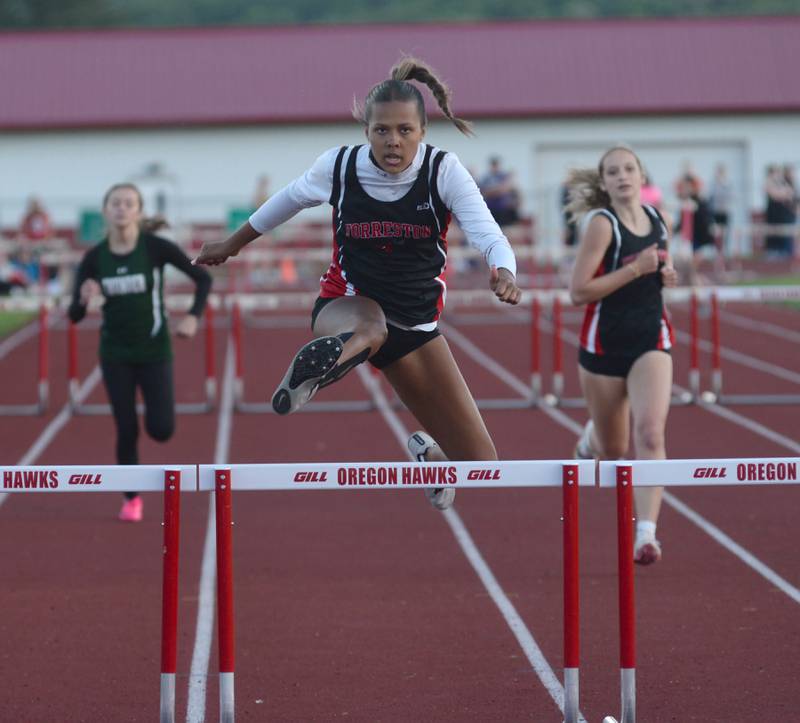 Forreston-Polo's Letrese Buisker clears a hurdle en route to a first place finish in the 300 hurdles at the 1A Oregon Sectional on Friday. May 10, 2024.