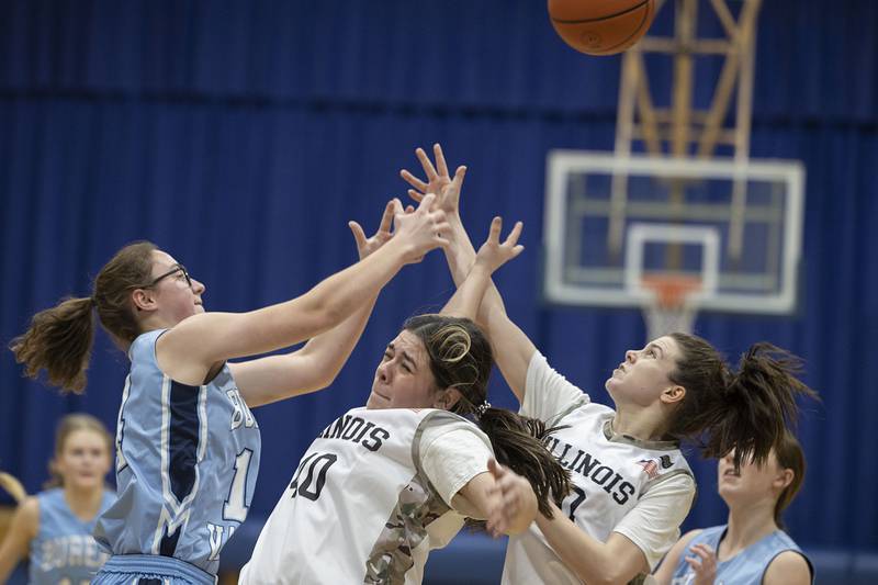 Newman’s Amiya Rodriguez works down low against Bureau Valley’s Lynzie Cady on Monday, Jan. 23, 2023.