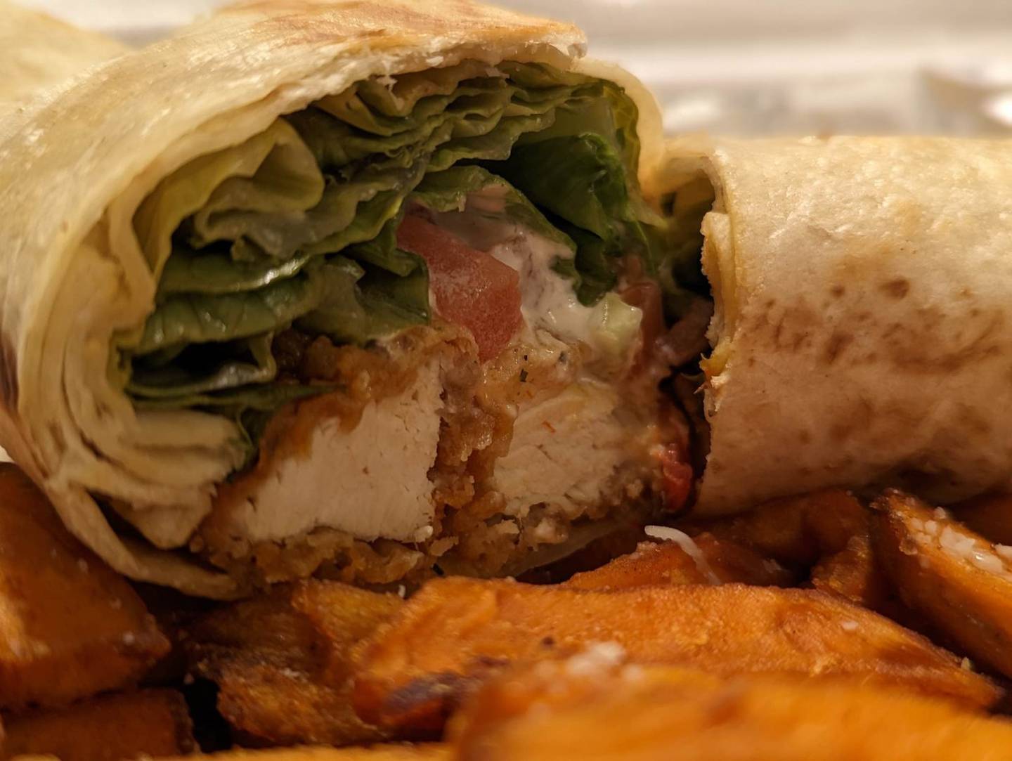 Pictured is a Buffalo chicken wrap as served by Craft'd Plainfield.