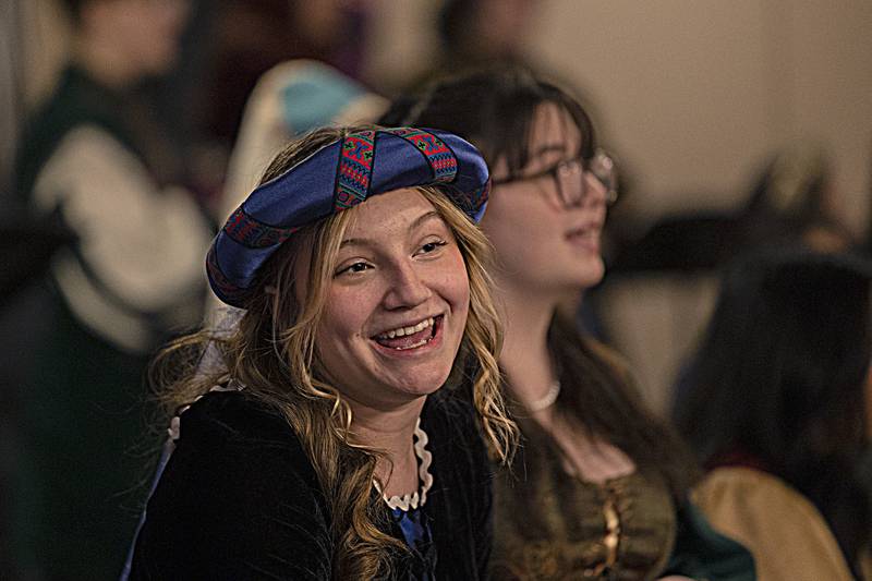 Choir members start the show Thursday, Dec. 21, 2023 during Dixon High School’s Madrigal Dinner at the Elks Club. The show was performed in three acts taking cues from the story of Christmas.