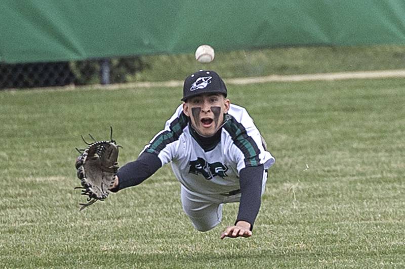 Rock Falls’ Austin Castaneda dives for a ball in centerfield against Sterling Friday, March 29, 2024 at Rock Falls High School.