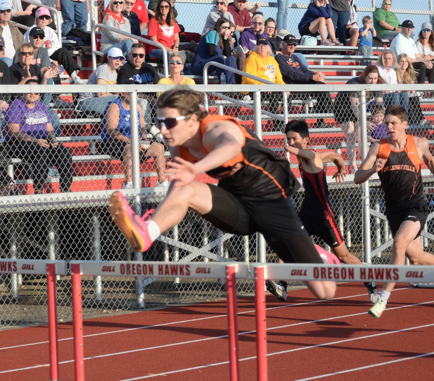 Milledgeville's Cason Johnson races in the 100 hurdles during the Hawk Classic in Oregon on Friday, April 28.