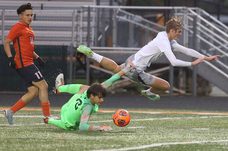 Romeoville’s keeper Alex Duda stops the offensive drive by Connor Herre of Joliet West on Wednesday, Oct. 11, 2023 in Romeoville.