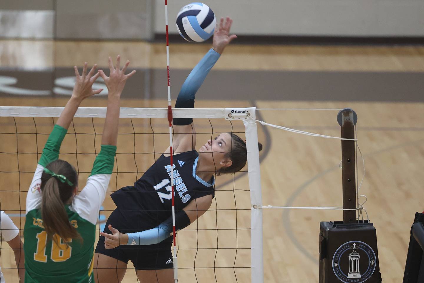 Joliet Catholic’s Ellie Blotnik goes for the kill against Providence on Thursday, Sept. 14, in Joliet.