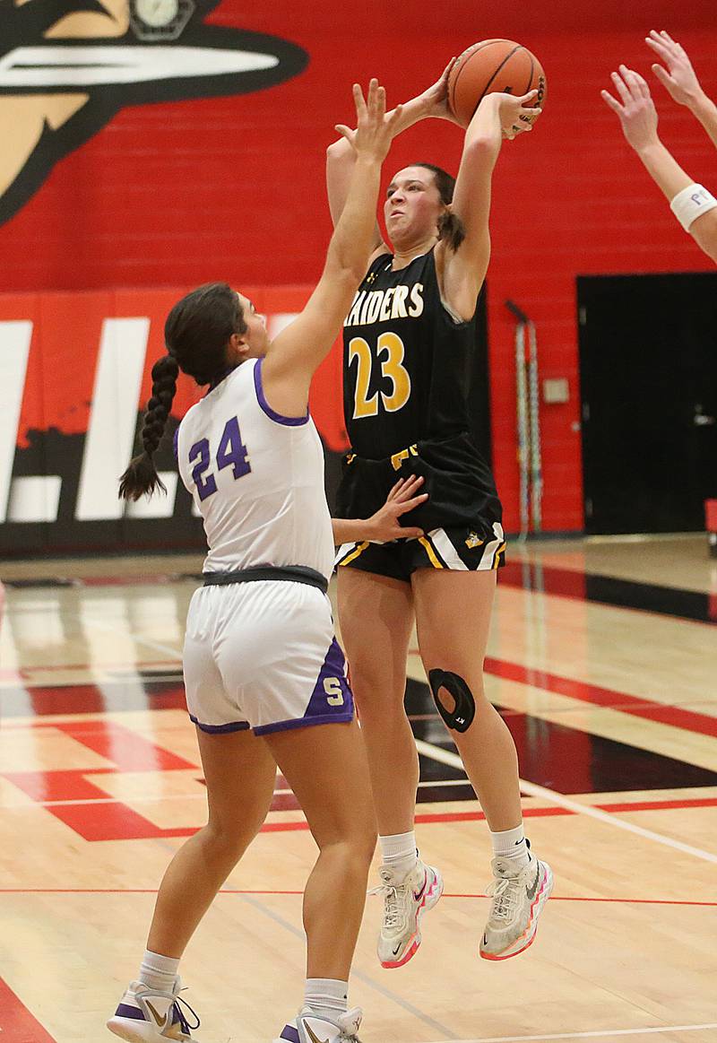 Ashton-Franklin Center's Briana Gonnerman shoots a jump shot over Serena's Paisley Twait during the Class 1A Regional final on Thursday, Feb. 15, 2024 at Earlville High School.