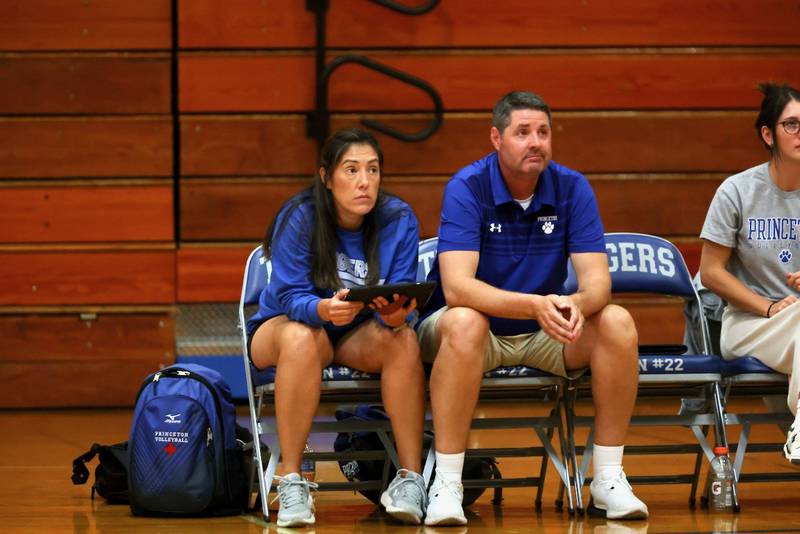 Princeton coach Andy Puck watches the game action from the bench along side his wife, Gina, as the TIgresses defeated Mendota 25-23, 25-19 Tuesday night at Prouty Gym.