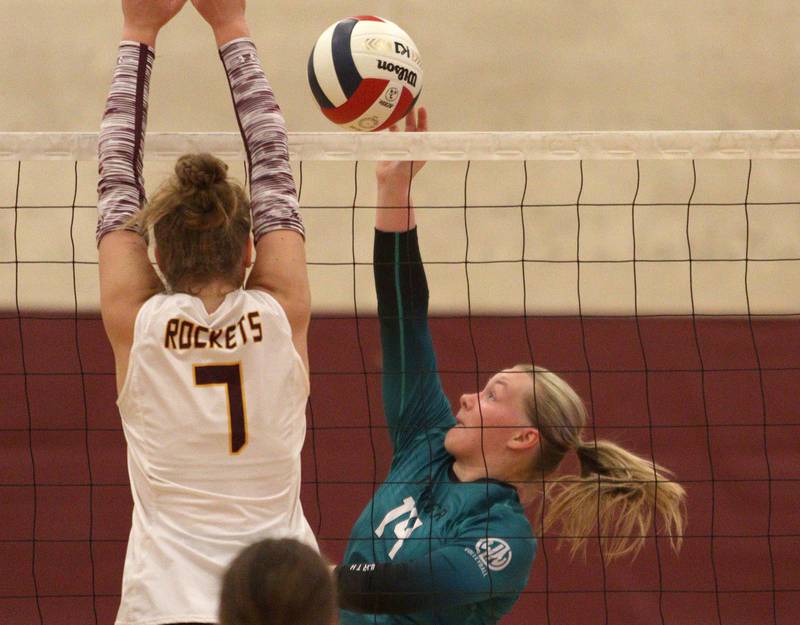 Woodstock North’s Devynn Schulze sends the ball over the net in varsity volleyball on Monday, Sept. 16, 2024, at Richmond-Burton High School in Richmond.