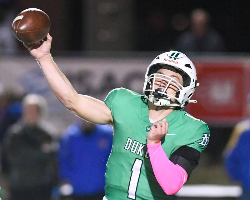 York High School Bruno Massel (1) passes the ball during the game on Friday Oct. 18, 2024, as they took on Lyons Township held at York High School in Elmhurst.