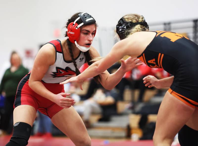 Yorkville's Athena Westphal goes up against against Minooka's Kira Cailteux during the Southwest Prairie Conference wrestling meet at Yorkville High School on Saturday, Jan. 21, 2023.