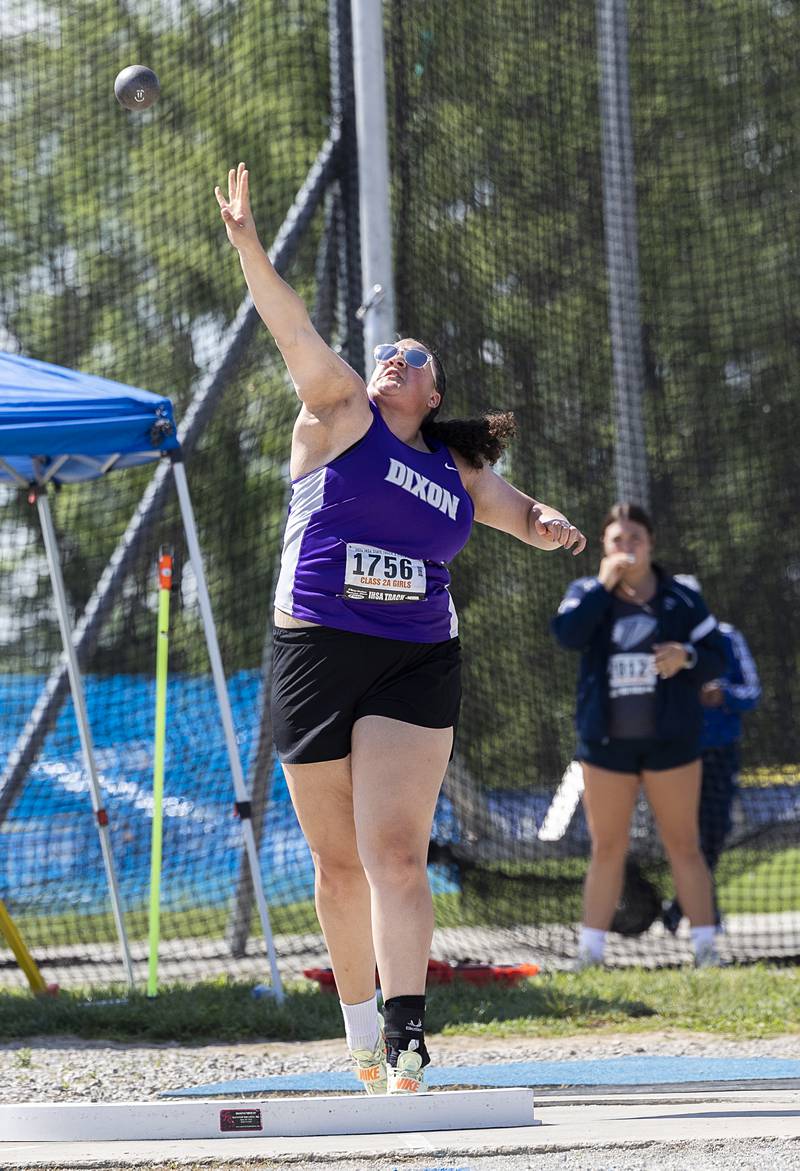 Dixon’s Olivia Cox throws the shot in the 2A Shot Put Saturday, May 18, 2024 at the IHSA girls state track meet in Charleston.