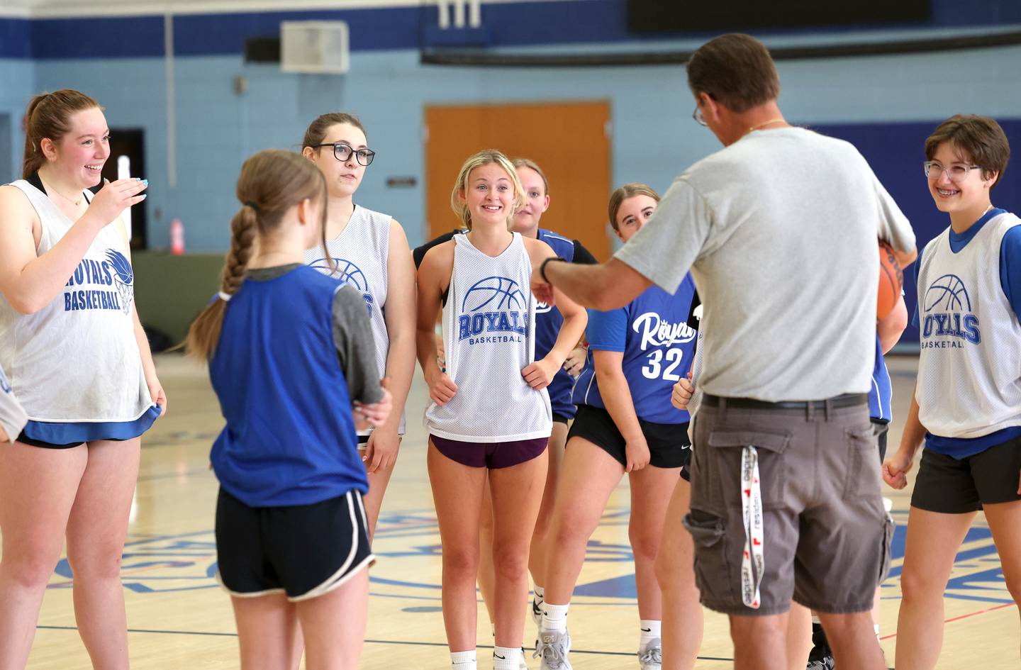 Hinckley-Big Rock players listen to new girls basketball head coach Bob Barnett during practice Monday, June 10, 2024, at the school in Hinckley.