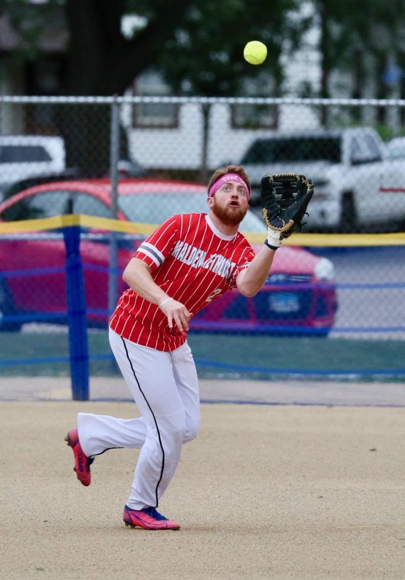 Michael Camp of Malden  Methodist camps under a fly ball in Tuesday's Princeton Park District Fastpitch League championship game opener Tuesday night at Westside Park.